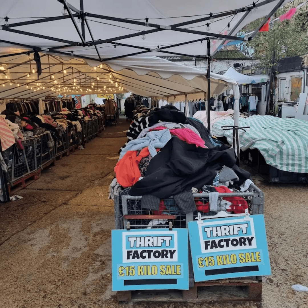Thrift Factory £15 kilo sale market with branded signs